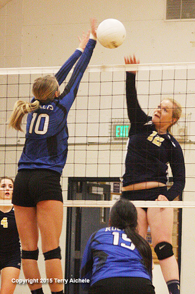 LEFT - The Echo player in the far court hits the ball into a Pilot Rock ...