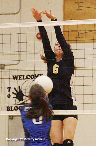 LEFT - An Echo player digs serve from Pilot Rock.[img_8282]RIGHT - An ...